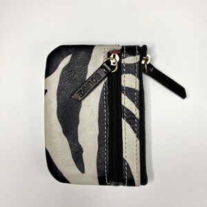 Genuine Dooney & Bourke card sized wallet with keychain. Side zipper for coins.